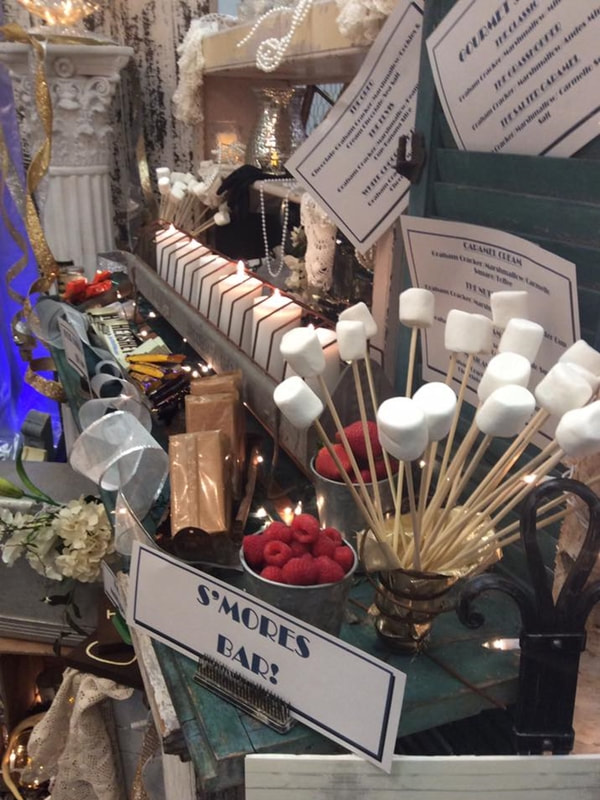 s'mores bar with vintage decor